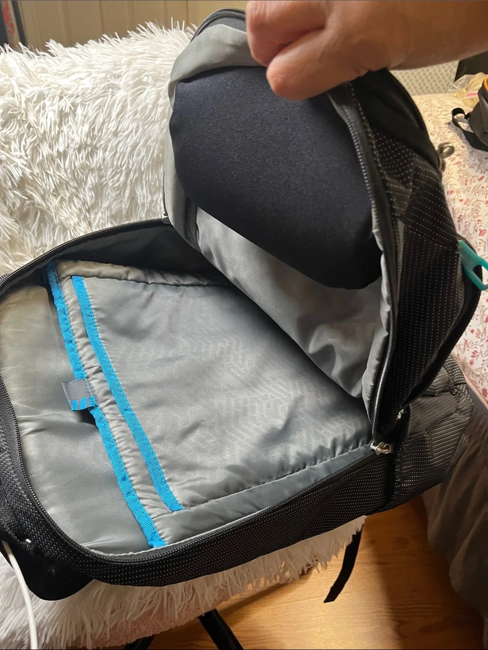 Thule Black Backpack with Teal Zipper Accents